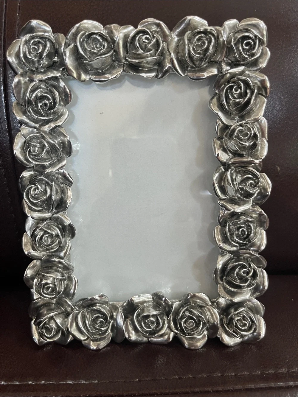 Rose adorned 6 1/2 x 4 1/2 metal frame
